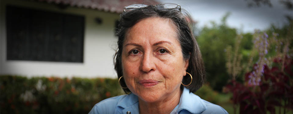 A portrait of Anabela Lemos looking into the camera.
