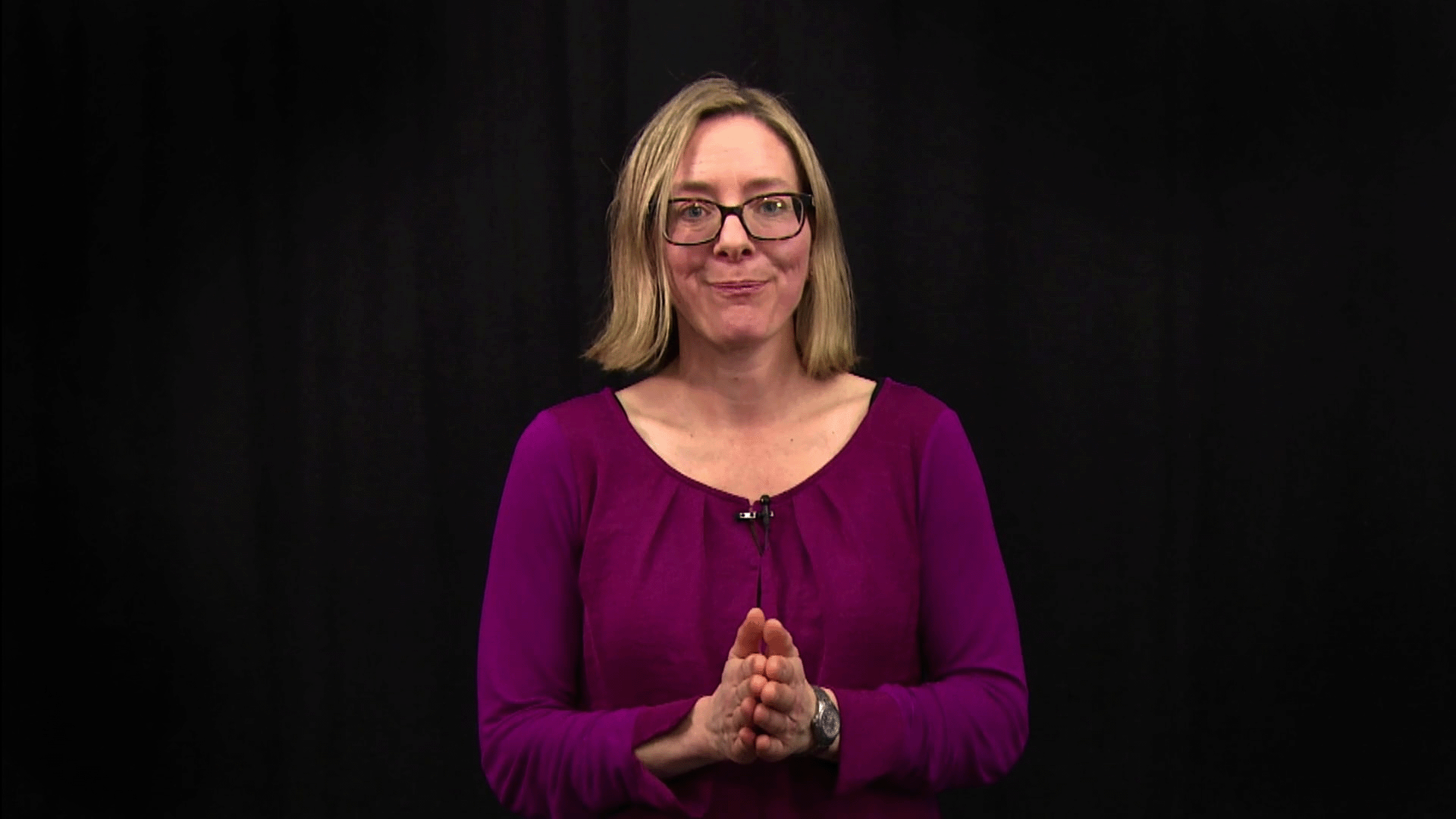 En person föreläser.