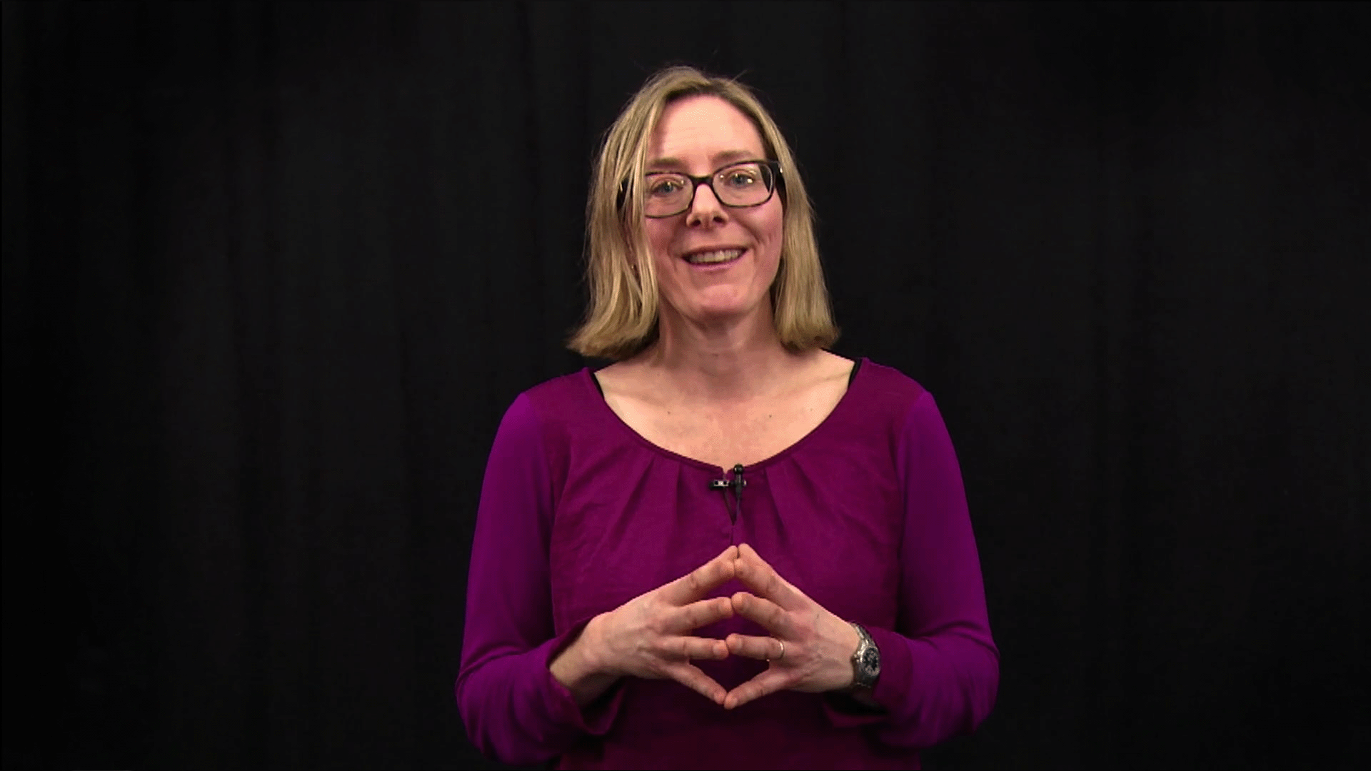 En person föreläser.